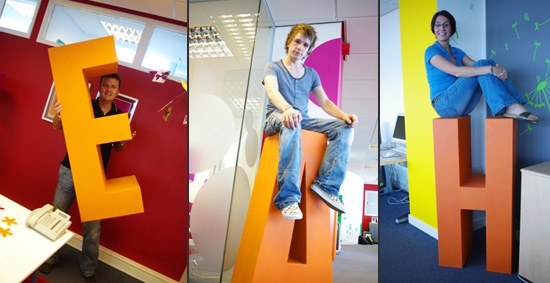 The Access team sitting and holding giant letters