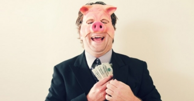 Stock Photograph of Pig with Money